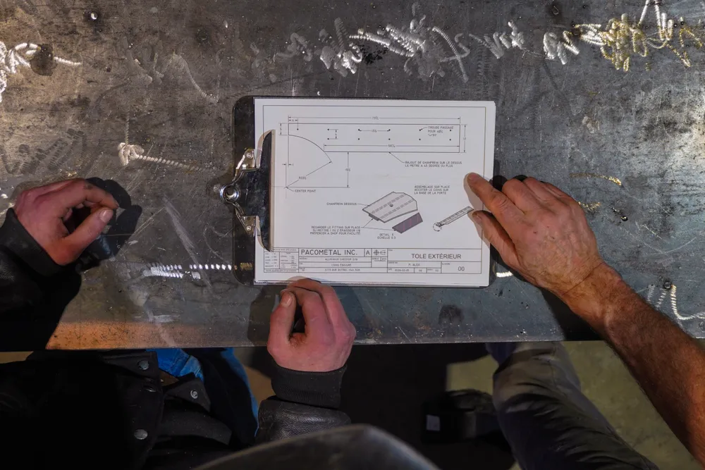 Shop drawing reviewed on a work table