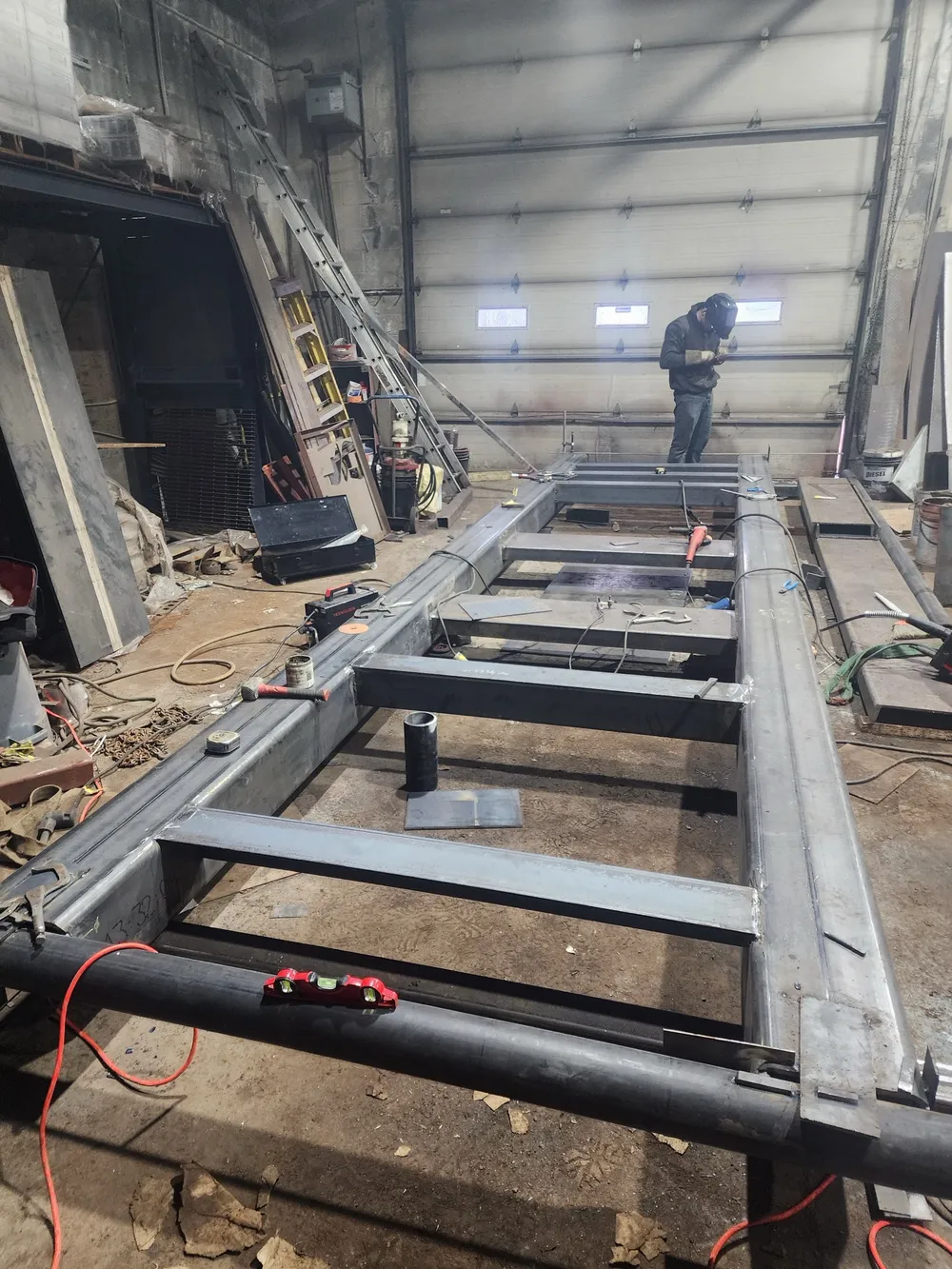 Welded steel chassis on the shop floor